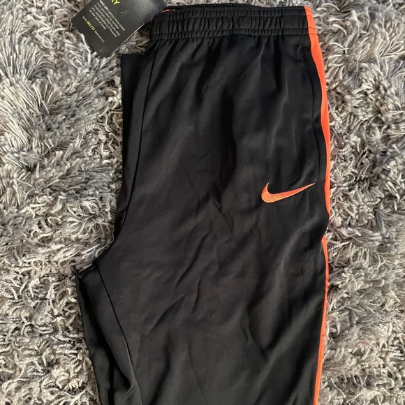 Black Friday sales!!!Youth Unisex Black/Orange Original Nike Athletic Pants - Picture 2 of 2